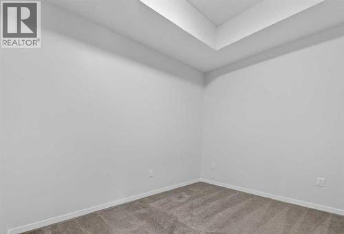 1410, 33 Carringham Gate Nw, Calgary, AB - Indoor Photo Showing Other Room