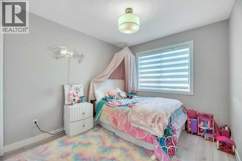 Bed #2 - 121 Dawson Circle, Chestermere, AB - Indoor Photo Showing Bedroom