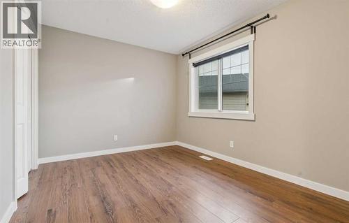 327 Panamount Point Nw, Calgary, AB - Indoor Photo Showing Other Room