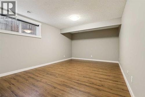 327 Panamount Point Nw, Calgary, AB - Indoor Photo Showing Other Room