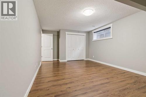 327 Panamount Point Nw, Calgary, AB - Indoor Photo Showing Other Room