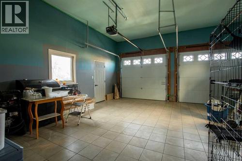 5018 42 Avenue, Taber, AB - Indoor Photo Showing Garage