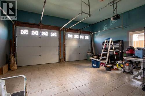 5018 42 Avenue, Taber, AB - Indoor Photo Showing Garage