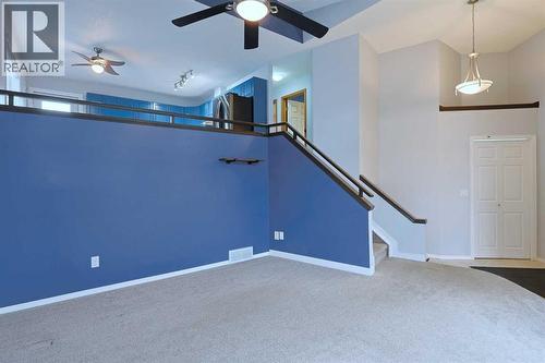 19 Sunridge Crescent Nw, Airdrie, AB - Indoor Photo Showing Other Room