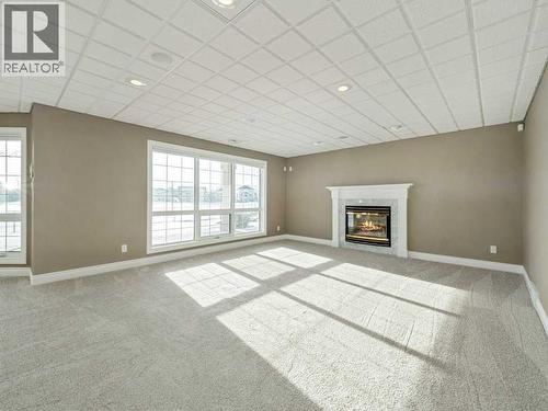 24 Fairmont Point S, Lethbridge, AB - Indoor With Fireplace