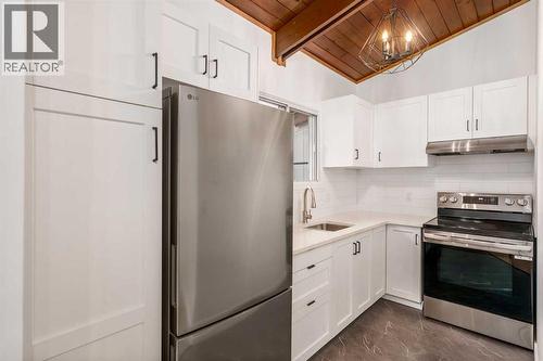 15 A Arlington Bay Se, Calgary, AB - Indoor Photo Showing Kitchen