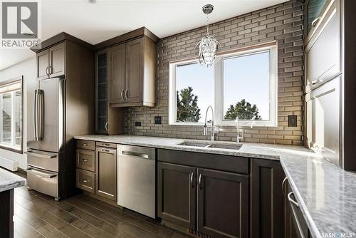 Matt Acreage, Edenwold, SK - Indoor Photo Showing Kitchen With Stainless Steel Kitchen With Double Sink