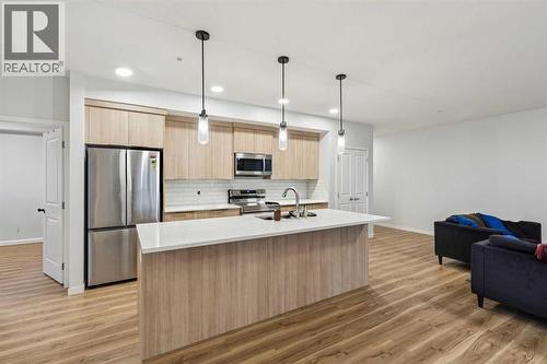 3116, 33 Carringham Gate Nw, Calgary, AB - Indoor Photo Showing Kitchen With Stainless Steel Kitchen With Upgraded Kitchen