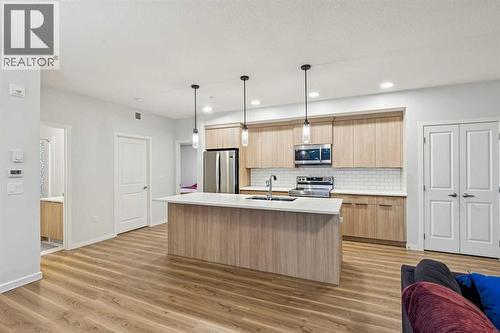 3116, 33 Carringham Gate Nw, Calgary, AB - Indoor Photo Showing Kitchen With Stainless Steel Kitchen With Upgraded Kitchen