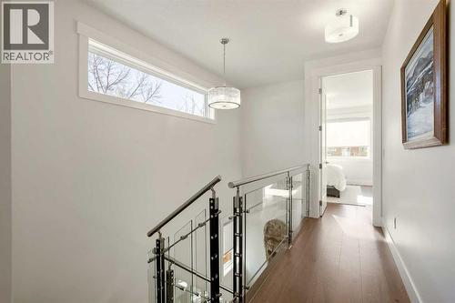 Upper Floor Hallway to Primary - 303 30 Avenue Ne, Calgary, AB - Indoor Photo Showing Other Room