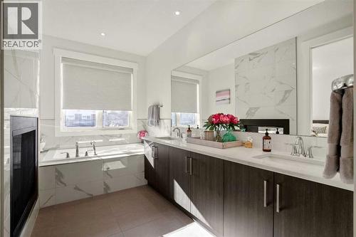His & Hers Vanity Sink + In-Floor Heating - 303 30 Avenue Ne, Calgary, AB - Indoor Photo Showing Bathroom