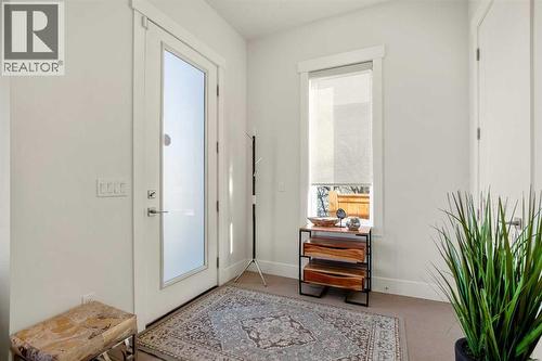 Large Front Foyer Style Entrance - 303 30 Avenue Ne, Calgary, AB - Indoor Photo Showing Other Room