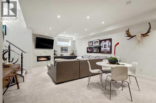 Basement Media Room + Another Gas Fire Place For Cozy Vibes - 303 30 Avenue Ne, Calgary, AB - Indoor With Fireplace