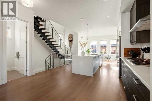 Wide Plank Oak Hardwood Flooring! - 303 30 Avenue Ne, Calgary, AB - Indoor Photo Showing Kitchen