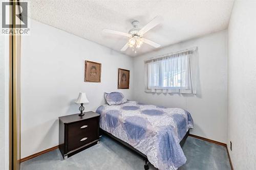 2205 80 Avenue Se, Calgary, AB - Indoor Photo Showing Bedroom