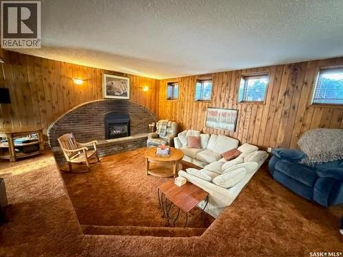 10 Dragan Crescent, Saskatoon, SK - Indoor Photo Showing Living Room With Fireplace