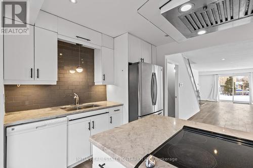 19 - 55 Arbour Glen Crescent, London East (East A), ON - Indoor Photo Showing Kitchen With Double Sink With Upgraded Kitchen