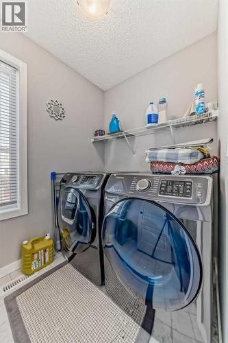 57 Cornerstone Manor Ne, Calgary, AB - Indoor Photo Showing Laundry Room