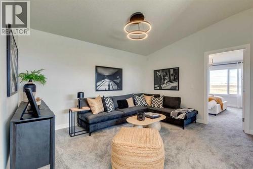 149 Southbow Drive, Cochrane, AB - Indoor Photo Showing Living Room