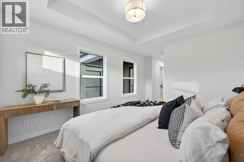 1051 Bayview Crescent, Airdrie, AB - Indoor Photo Showing Bedroom
