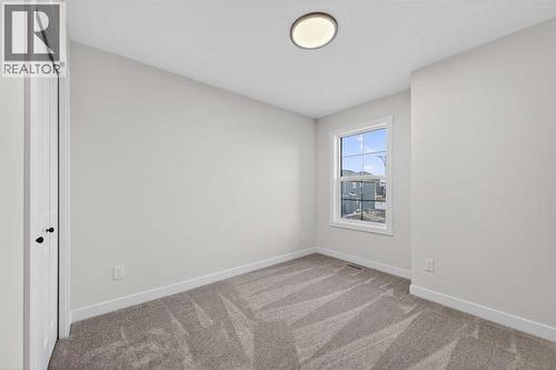 1051 Bayview Crescent, Airdrie, AB - Indoor Photo Showing Other Room