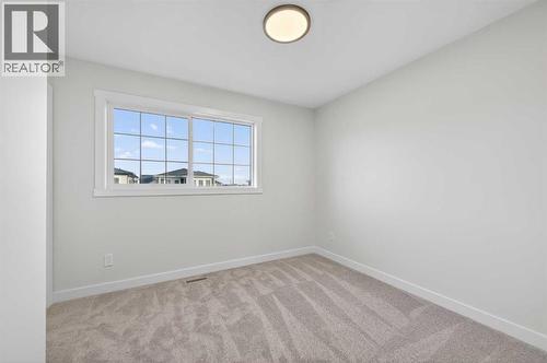 1051 Bayview Crescent, Airdrie, AB - Indoor Photo Showing Other Room