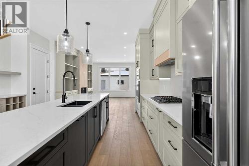 1137 41 Street Sw, Calgary, AB - Indoor Photo Showing Kitchen With Double Sink With Upgraded Kitchen