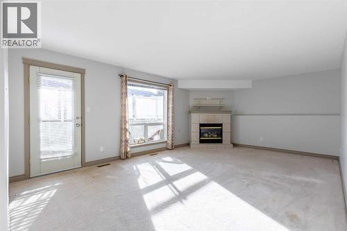 314, 23 Chilcotin Lane W, Lethbridge, AB - Indoor With Fireplace