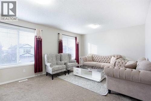 138 Saddlecrest Way Ne, Calgary, AB - Indoor Photo Showing Living Room