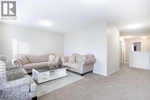 138 Saddlecrest Way Ne, Calgary, AB - Indoor Photo Showing Living Room
