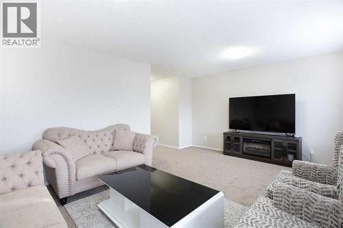 138 Saddlecrest Way Ne, Calgary, AB - Indoor Photo Showing Living Room