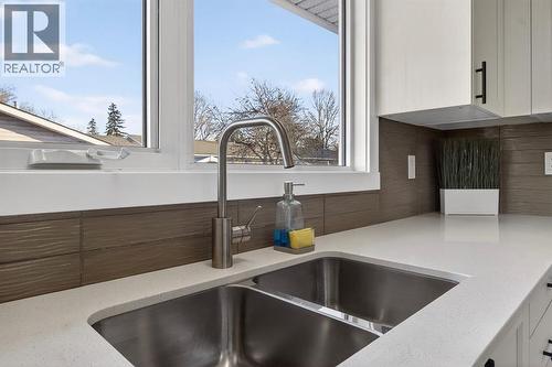 203 Lynnover Place Se, Calgary, AB - Indoor Photo Showing Kitchen With Double Sink