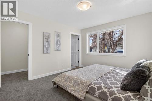 203 Lynnover Place Se, Calgary, AB - Indoor Photo Showing Bedroom