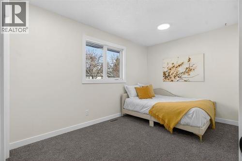203 Lynnover Place Se, Calgary, AB - Indoor Photo Showing Bedroom