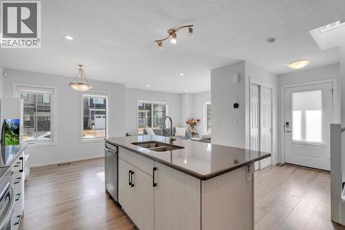 4 Southwinds Gate Sw, Airdrie, AB - Indoor Photo Showing Kitchen With Double Sink