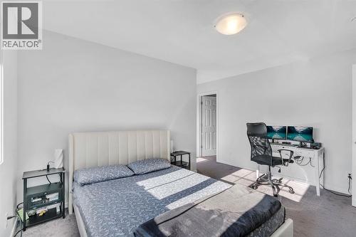 4 Southwinds Gate Sw, Airdrie, AB - Indoor Photo Showing Bedroom