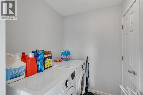 4 Southwinds Gate Sw, Airdrie, AB - Indoor Photo Showing Laundry Room