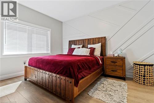 Bedroom featuring wood finished floors - 24 Tamarack Way, Simcoe, ON - Indoor Photo Showing Bedroom
