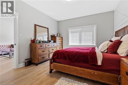 Bedroom with light wood-type flooring - 24 Tamarack Way, Simcoe, ON - Indoor Photo Showing Bedroom