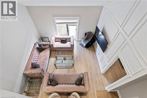 Living room featuring light wood-style flooring - 24 Tamarack Way, Simcoe, ON - Indoor
