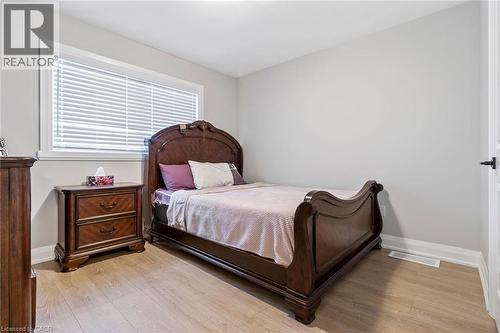 Bedroom featuring light wood-style floors - 24 Tamarack Way, Simcoe, ON - Indoor Photo Showing Bedroom