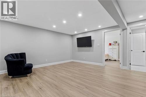 Unfurnished room featuring recessed lighting and light wood finished floors - 24 Tamarack Way, Simcoe, ON - Indoor