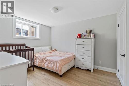 Bedroom with light wood-style flooring - 24 Tamarack Way, Simcoe, ON - Indoor Photo Showing Bedroom