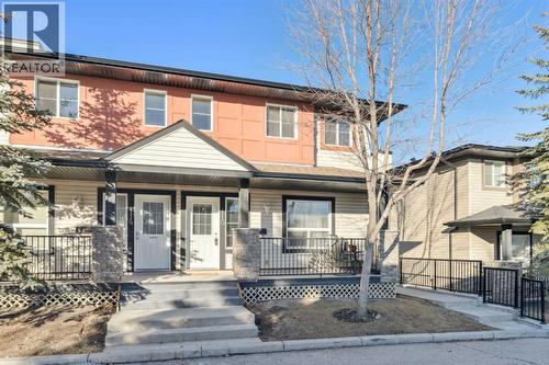 110 Eversyde Common Sw, Calgary, AB - Outdoor With Deck Patio Veranda With Facade