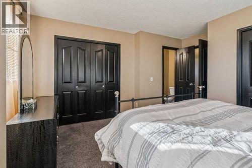 110 Eversyde Common Sw, Calgary, AB - Indoor Photo Showing Bedroom