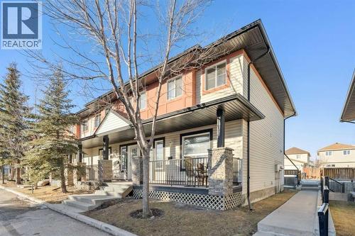 110 Eversyde Common Sw, Calgary, AB - Outdoor With Deck Patio Veranda