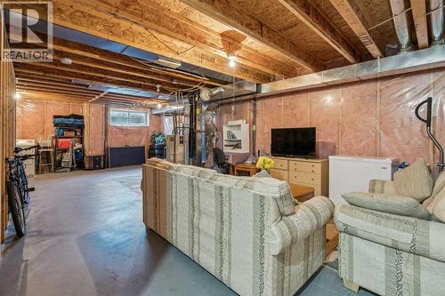 110 Eversyde Common Sw, Calgary, AB - Indoor Photo Showing Basement