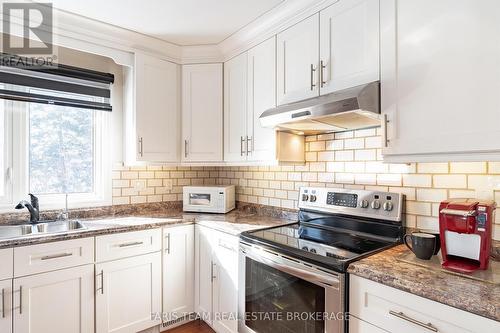 360 Concession Road 6 E, Tiny, ON - Indoor Photo Showing Kitchen With Double Sink