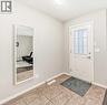 Front entrance area - 822 Panatella Boulevard Nw, Calgary, AB  - Indoor Photo Showing Other Room 