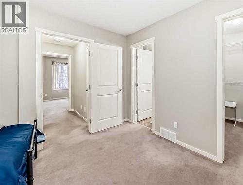 822 Panatella Boulevard Nw, Calgary, AB - Indoor Photo Showing Other Room